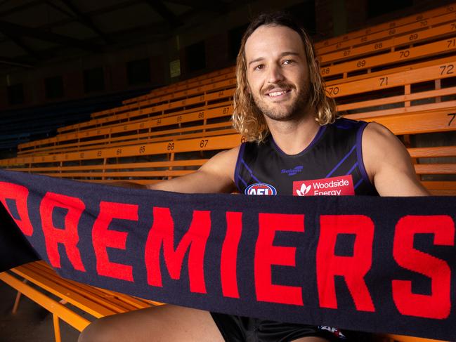 Fremantle AFL footballer, James Aish at the Norwood SA football club with 2022 Premiers scarf in grandstand. Pictured on April 10th 2023. Picture: Ben Clark