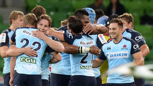 The Waratahs celebrate their epic comeback. Picture: AAP