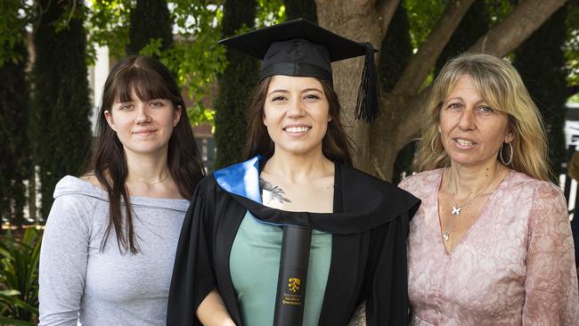 Bachelor of Nursing graduate Caitlin White with sister Sarah White and mum Helen White at a UniSQ graduation ceremony at The Empire, Tuesday, October 29, 2024. Picture: Kevin Farmer