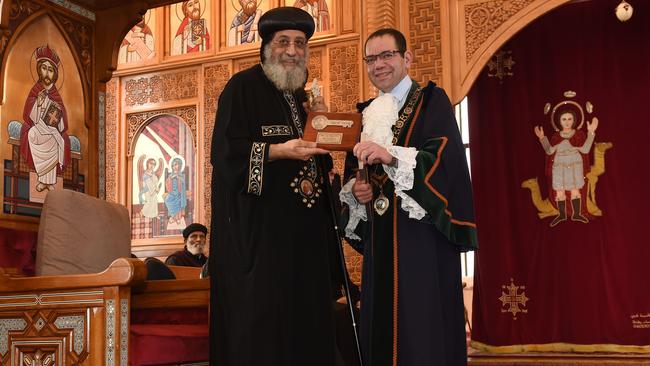 Devout Coptic Orthodox and embattled councillor Sam Aziz (right) with Pope Tawadros II who toured Melbourne in 2017.