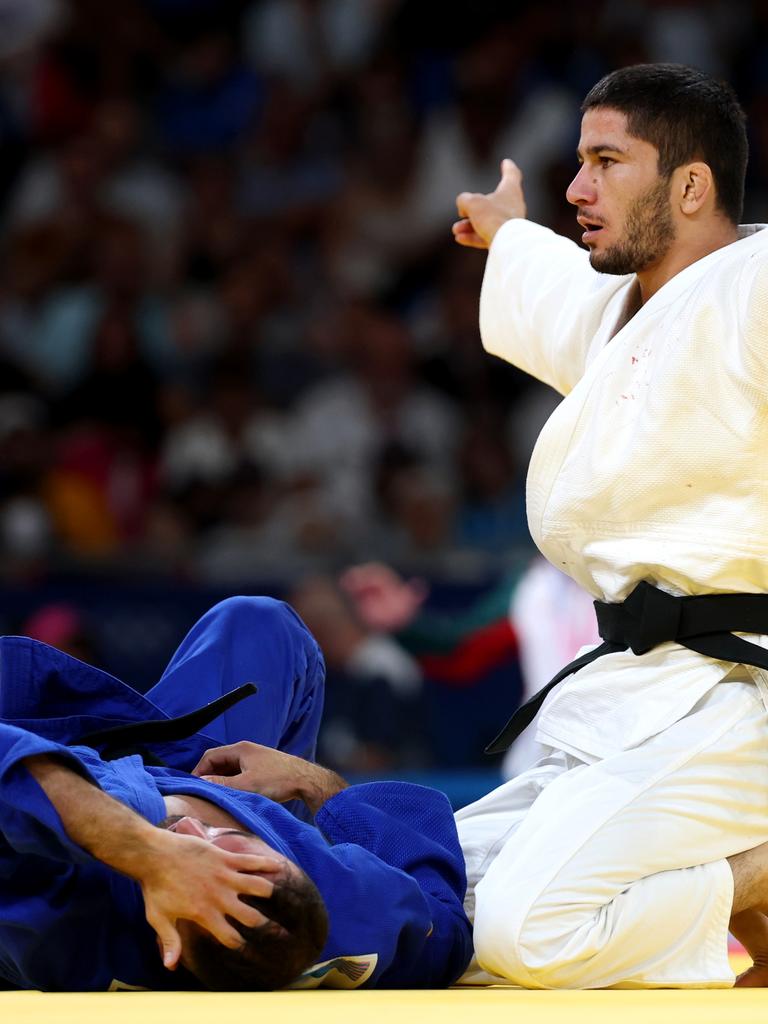 Emomali after defeating Shmailov . (Photo by Michael Reaves/Getty Images)