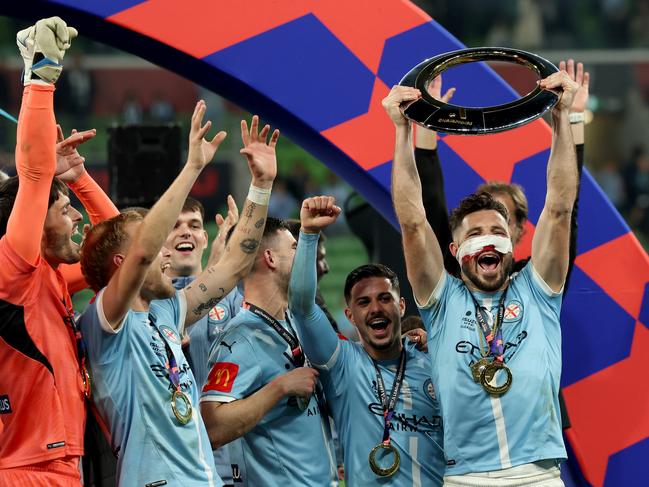Mathew Leckie (right) celebrates Melbourne City’s A-League grand final win with his teammates. Picture: Robert Cianflone/Getty Images