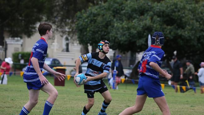 Day 1 of the King of the Country junior rugby union tournament at the Gold Coast Eagles Rugby Union Club.Maroochydore Swans (BLUE AND BLACK) vs USQ Saints (Blue ) Maroochydore Player No10 Luke Sparke USQ Player No Pic Mike Batterham