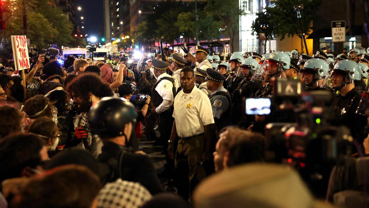 Police line up amid a protest at the Israeli consulate. Picture: AFP