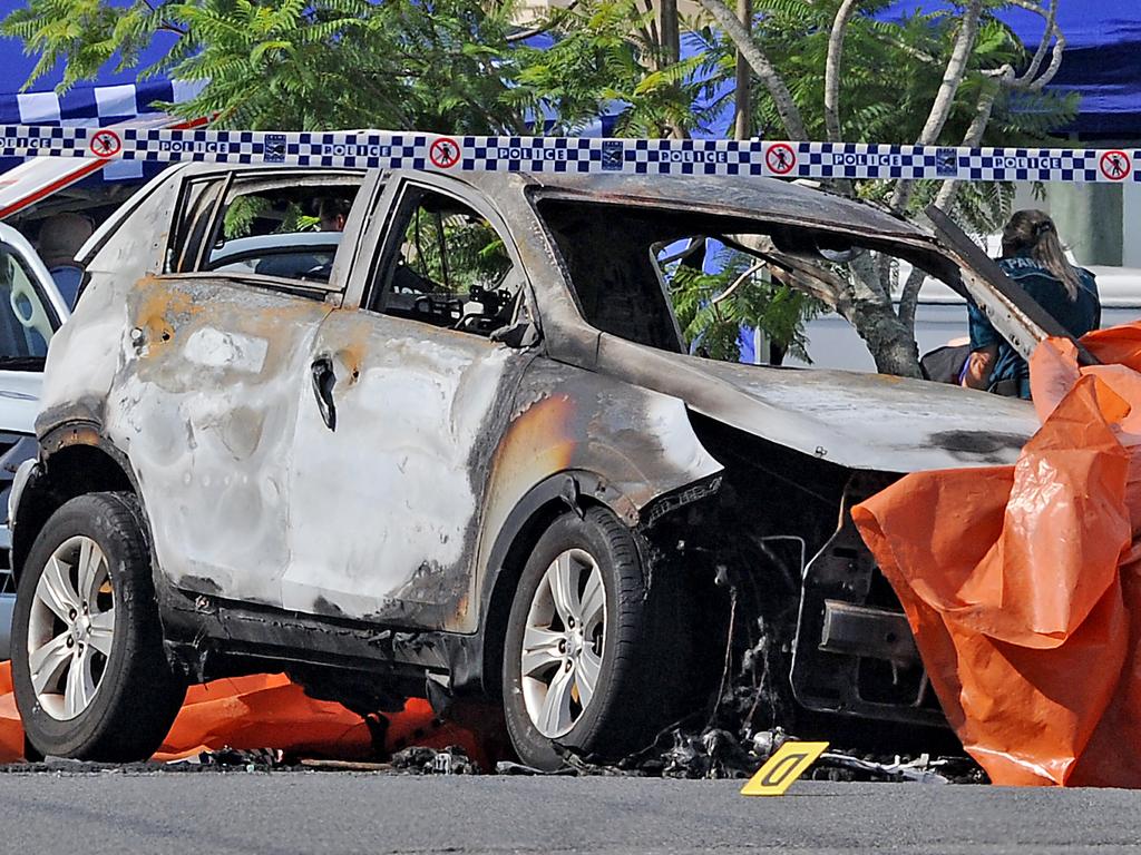 The man reportedly rushed to the car to try and free the family trapped inside. Picture: John Gass/AAP