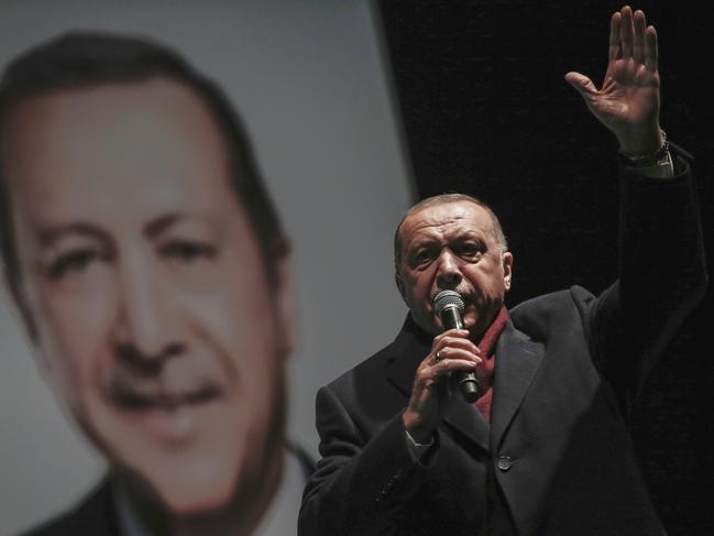 Turkey’s President Recep Tayyip Erdogan addresses supporters of his ruling Justice and Development Party, AKP, at a rally in Istanbul on Tuesday. Picture: AP