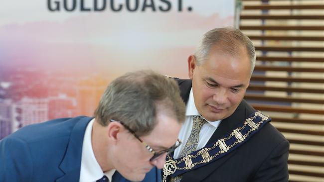 Mayor Tom Tate at Evandale, being sworn in by CEO Dale Dickson as Gold Coast Mayor for a third term. Picture Glenn Hampson.