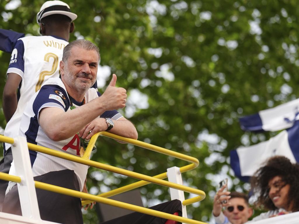 Tottenham Hotspur manager Ange Postecoglou on the open-top team bus during the Europa League winners parade in North London. Picture: AP Photo
