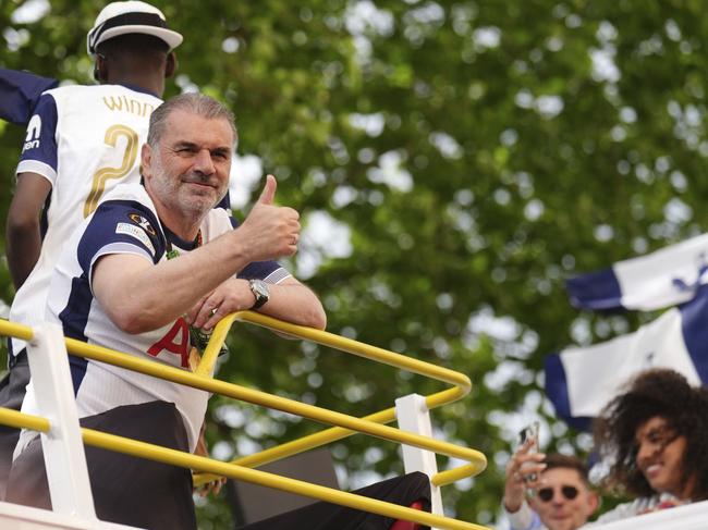 Tottenham Hotspur manager Ange Postecoglou on the open-top team bus during the Europa League winners parade in North London. Picture: AP Photo