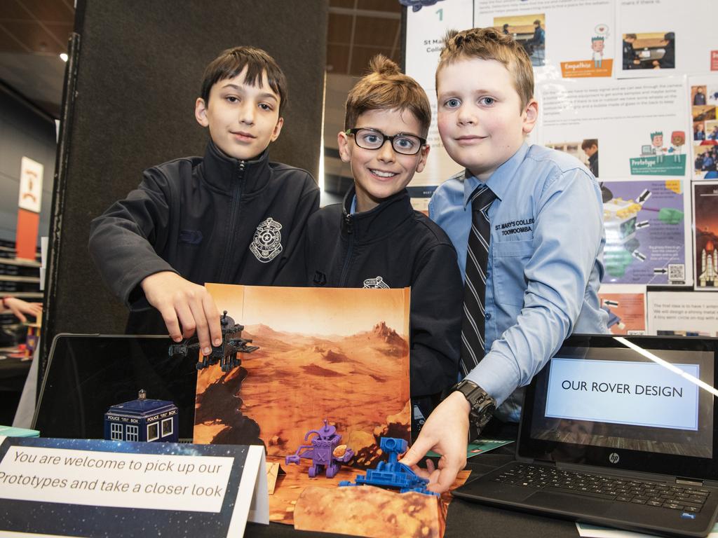 St Mary's College students (from left) Joshua Collins, Hugo Brownsdon and Riley Gibson with their mission to mars project in Kids in Space Queensland finals and showcase at Edmund Rice Cultural Centre St Mary's College, Friday, June 7, 2024. Picture: Kevin Farmer