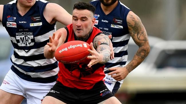 Nathan Rayment of Romsey gathers the ball during the round 16 Riddell District Football Netball League 2023 Bendigo Bank Seniors match between Romsey and Macedon at Romsey Park in Romsey, Victoria on August 5, 2023. (Photo by Josh Chadwick)