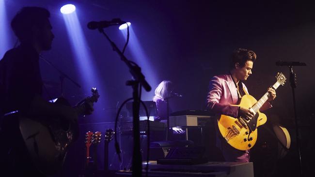 Harry Styles displayed guitar chops and rock swagger at his album launch show in London on the weekend. Picture: Sofi Adams