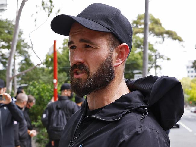 WEEKEND TELEGRAPH - 26.1.24UNTIL MUST NOT PUBLISH  BEFORE CLEARING WITH PIC EDITOR  - Members from the Neo Nazi group NSN are moved on by police at North Sydney after they tried to go to the city to protest. Leader of the group Thomas Sewell pictured.  Picture: Sam Ruttyn