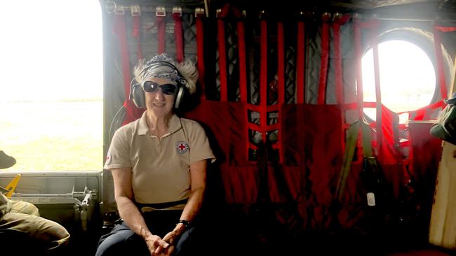 Australian Red Cross Volunteer Helen Martin in ADF Chinook helicopter heading for Bendoc in January 2020 following the Black Summer Bushfires.