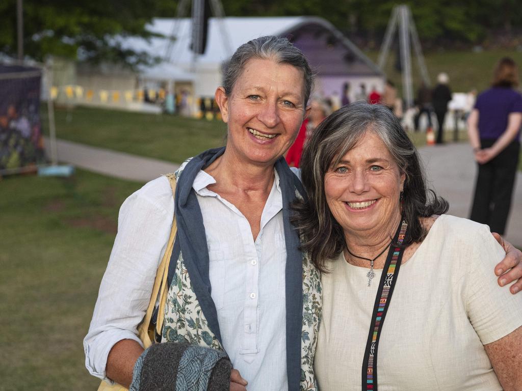 Eva Schmidt (left) and Maree Rosier at the Symphony Under the Stars concert performed by the Queensland Symphony Orchestra in Queens Park Amphitheatre for Carnival of Flowers, Friday, October 4, 2024. Picture: Kevin Farmer