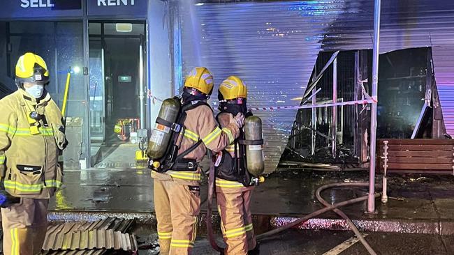 Firefighters fight a fire at a tobacco shop in Epping after it was set ablaze in a suspected arson attack. Picture: Epping Fire Brigade