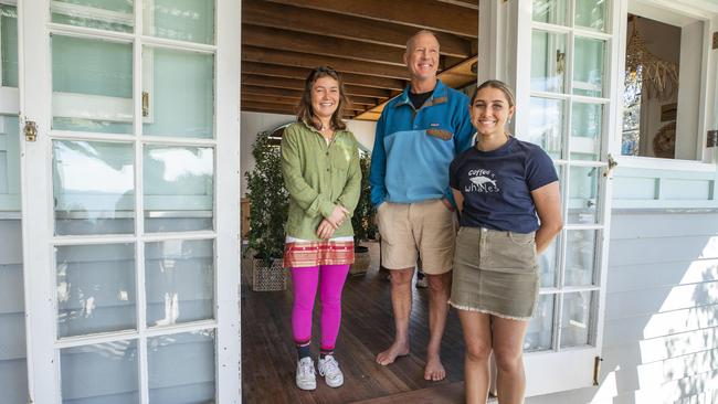 Blue Room Cafe Owner John Truman with staff Kiwani Goebell 22, and Jade Beutel 18 at Point Lookout. Picture: Lachie Millard