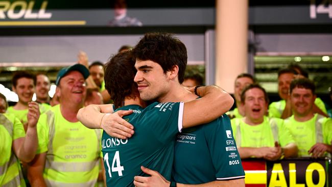 BAHRAIN, BAHRAIN – MARCH 05: Third placed Fernando Alonso of Spain and Aston Martin F1 Team celebrates with Lance Stroll of Canada and Aston Martin F1 Team and his team after the F1 Grand Prix of Bahrain at Bahrain International Circuit on March 05, 2023 in Bahrain, Bahrain. (Photo by Clive Mason/Getty Images)