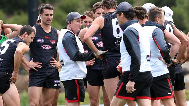 Xavier Richards listens in as John Worsfold addresses the troops. Picture: Hamish Blair