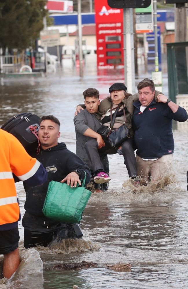 Residents told to evacuate or prepare to leave as heavy rainfall flows ...