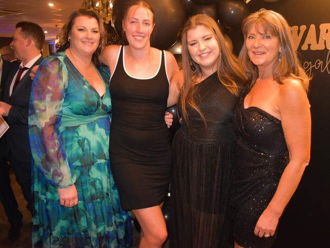 Kirsten Woodall, Kayla Woodall, Tara Whelan and Wenz Whelan having a great night at the Cowwarr Saints Football &amp; Netball Club Golden Gala Ball 2024. Picture: Jack Colantuono