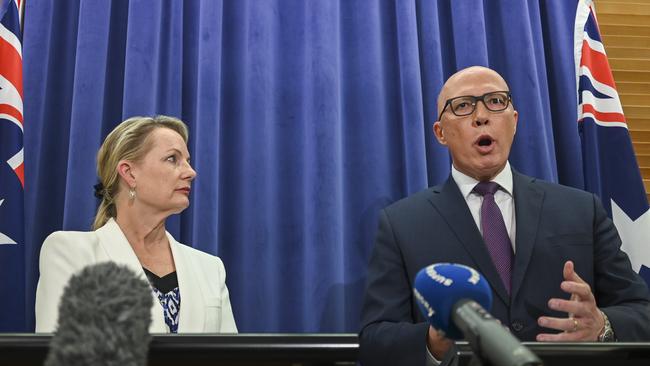 Peter Dutton and Sussan Ley address the media in the opposition party room.