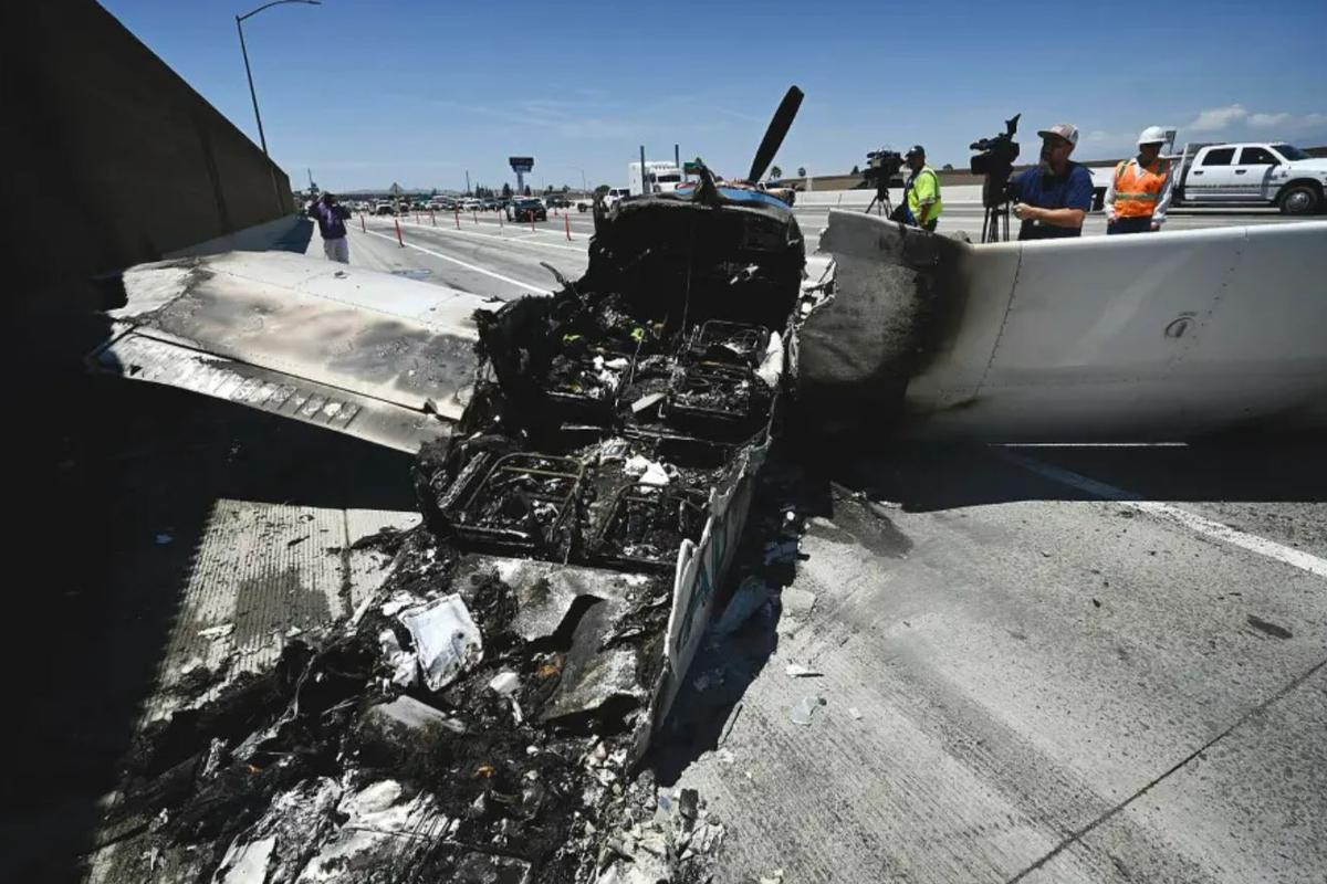 Dramatic moment plane crash-lands onto a busy highway | news.com.au ...