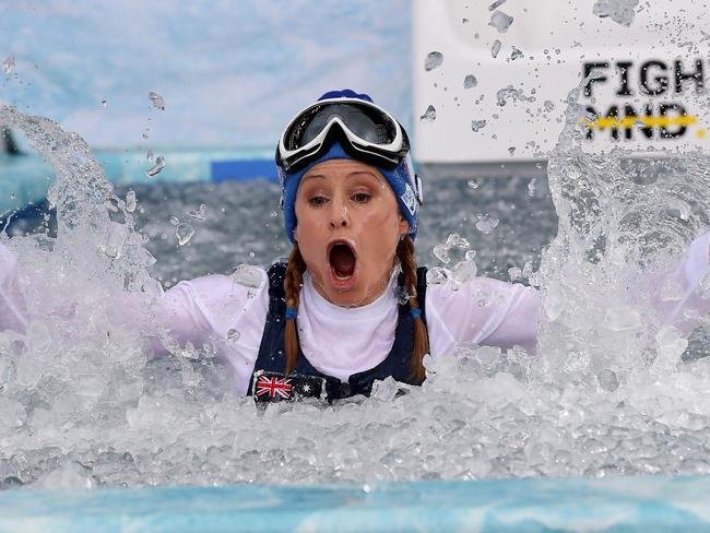 Big Freeze 3 at the MCG. Alisa Camplin feels how cold the water is  . Pic: Michael Klein