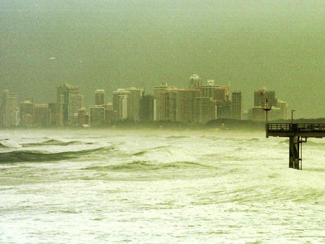 1999: A view of Surfers Paradise and rough seas taken from the southern wall of the Gold Coast Seaway.