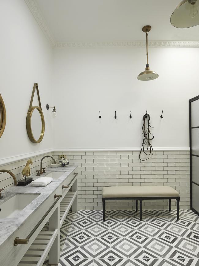 Mosaic-patterned tiles make a statement in this bathroom.