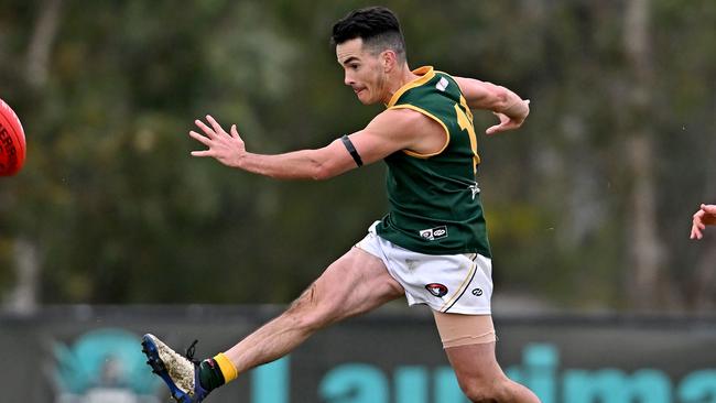 Ben Cox gets a kick for Old Eltham Collegians. Picture: Andy Brownbill