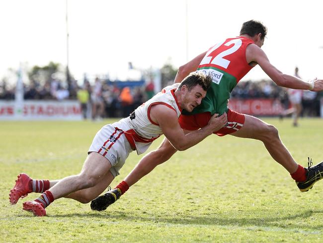 Luke Tapscott tackles Guy Hendry during the MPNFL Division 1 grand final. Picture: Andy Brownbill.