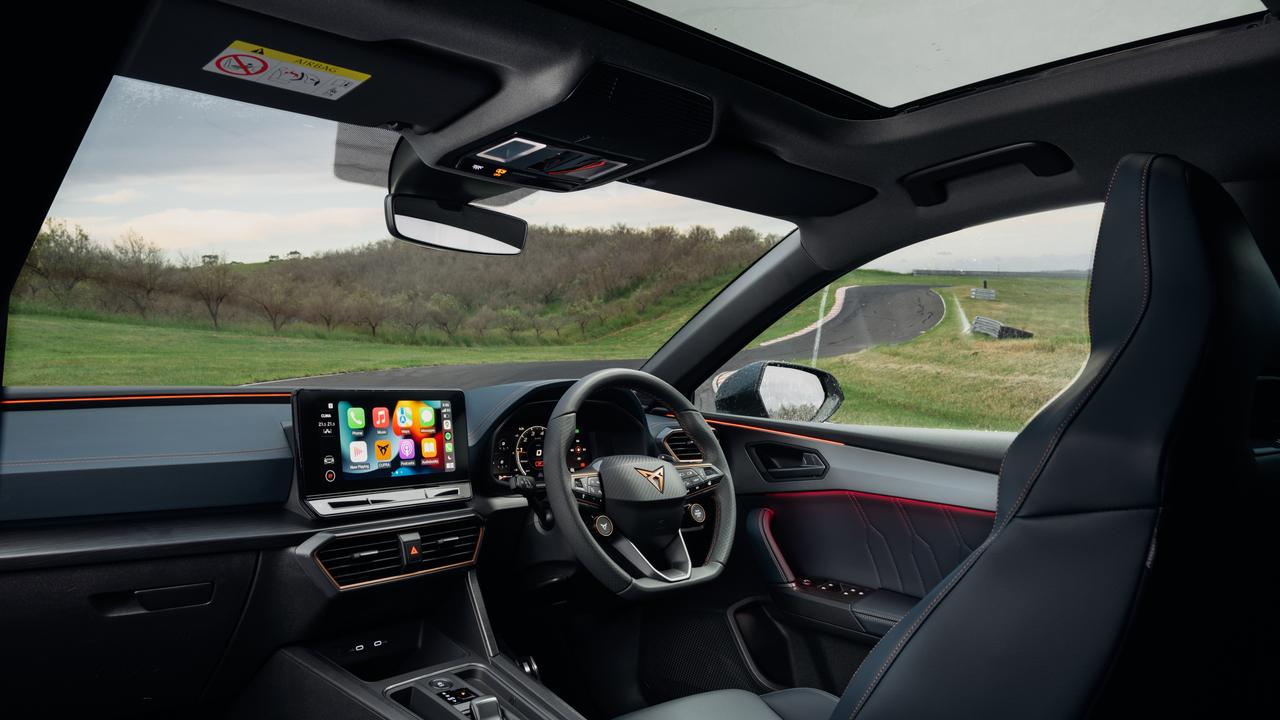 Among the Cupra Leon VZx cabin highlights are a 12-inch central touchscreen, 10.25-inch digital driver instruments, wireless phone charging and smartphone mirroring apps, along with three-zone aircon.