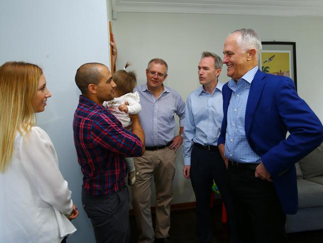 Prime Minister Malcolm Turnbull, Treasurer Scott Morrison and local member for Banks David Coleman meet with local family Julian and Kim Mignacca and daughter Addison, one. Picture: Britta Campion / The Australian