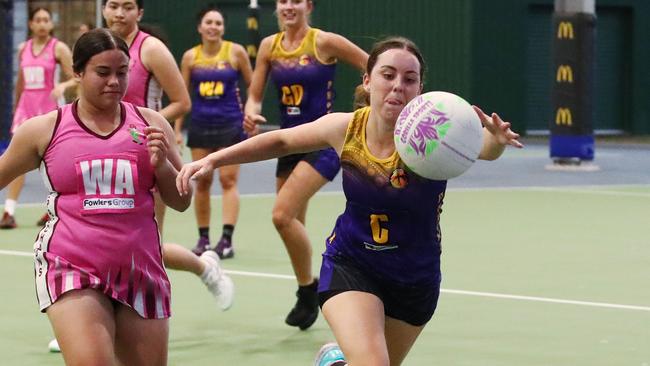 Fierce's Leah O'Brien chases the ball over the sideline in the Cairns Netball match between the Leprechauns and the Phoenix Fierce. PICTURE: BRENDAN RADKE