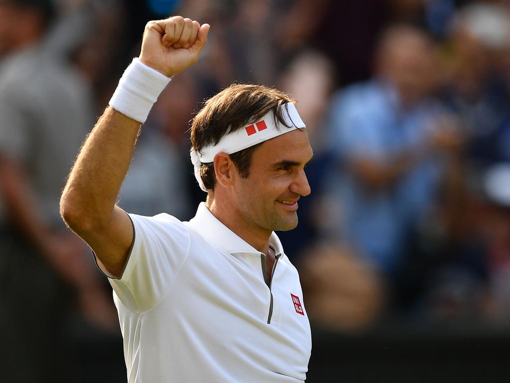 Switzerland's Roger Federer celebrates beating Japan's Kei Nishikori. (Photo by Daniel LEAL-OLIVAS / AFP)