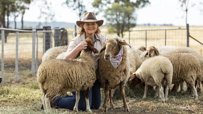 Dallas Davidson, of Towri Sheep Cheeses with some of her flock. Picture: Mark Cranitch