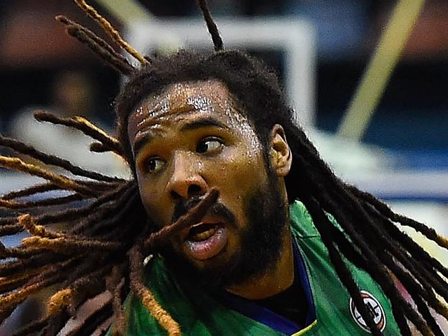 TOWNSVILLE, AUSTRALIA - DECEMBER 02: Jordair Jett of the Crocodiles looks to pass the ball during the round nine NBL match between the Townsville Crocodiles and the Cairns Taipans on December 2, 2015 in Townsville, Australia. (Photo by Ian Hitchcock/Getty Images)