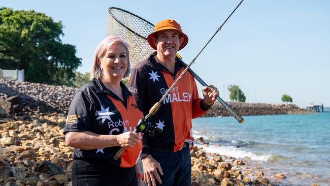 Deputy Opposition Leader Gerard Maley and Robyn Cahill wets a line as the CLP announces it will trial a fish stocking program for barramundi to be released in Darwin Harbour if elected. Picture: Pema Tamang Pakhrin