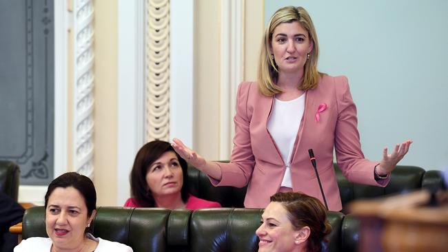 Minister for Communities, Women and Youth, Minister for Child Safety and Minister for the Prevention of Domestic and Family Violence, Shannon Fentiman gestures during the question time in the Queensland parliament. (AAP Image/Dave Hunt)