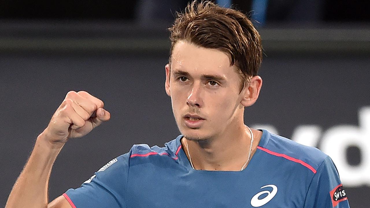 Alex De Minaur celebrates after defeating his compatriot Jordan Thompson.