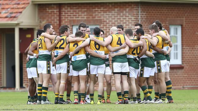 Salisbury North players huddle before a game in 2016. Picture: Sarah Reed.