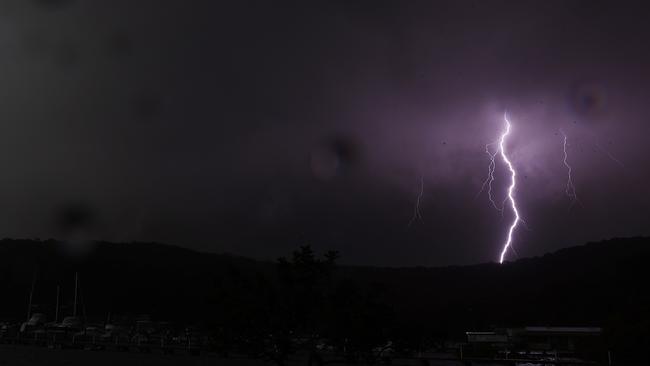 Summer storms across Australia bring the added danger of lightning strikes sparking bushfires. Picture: NCA NewsWire / David Swift