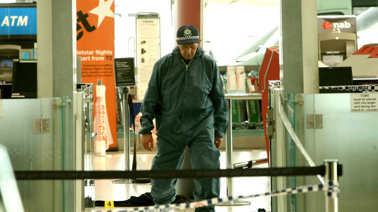 Police investigate the aftermath of the terrifying airport brawl.