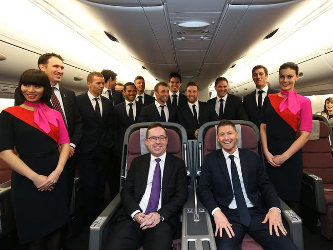 The Australian Cricket Team with captain Michael Clarke and Qantas CEO Alan Joyce pose for a photograph at their Farewell Event at Hangar 96, Qantas Sydney Jetbase.
