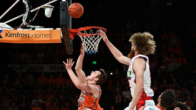 Sam Waardenburg of the Taipans drives to the basket during the round two NBL match between Cairns Taipans and Perth Wildcats at Cairns Convention Centre, on October 10, 2022, in Cairns, Australia. Picture: Emily Barker/Getty Images