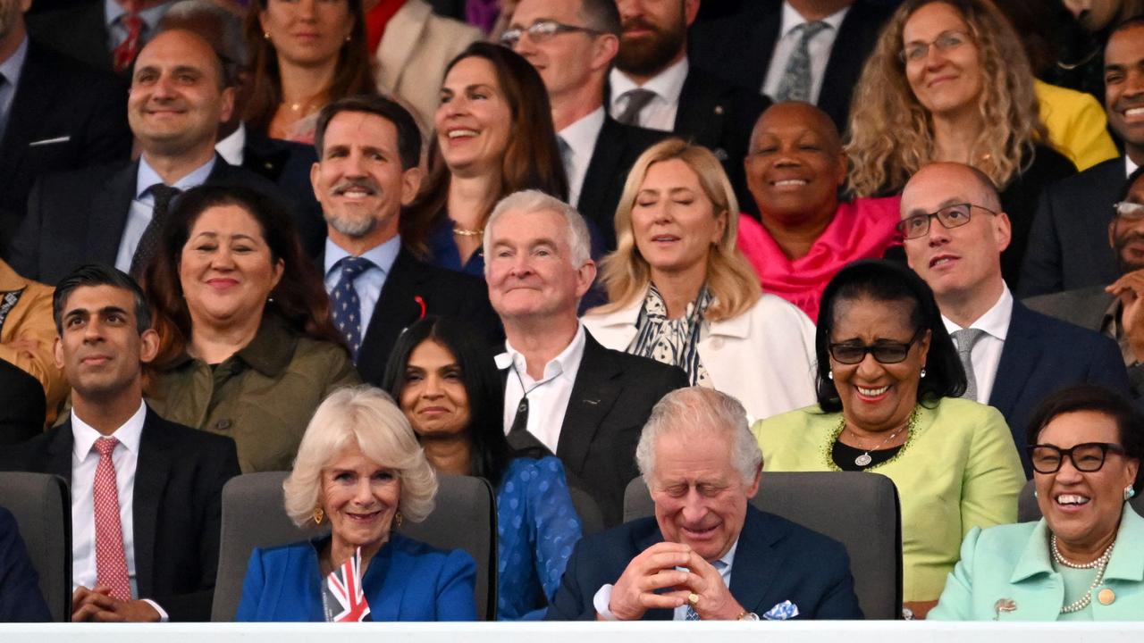 Britain's Queen Camilla and Britain's King Charles III react at the concert. Picture: AFP