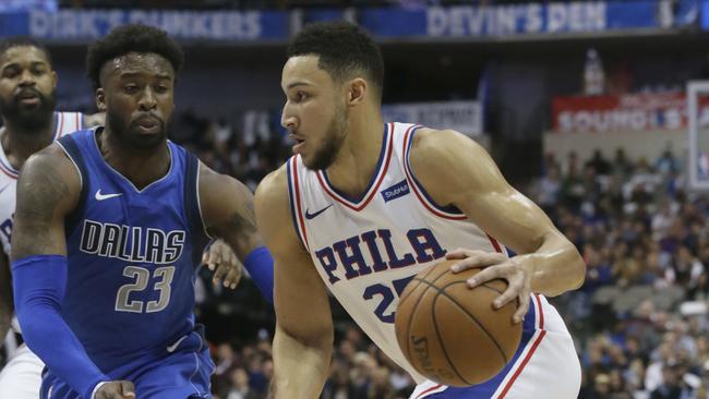 Philadelphia 76ers guard Ben Simmons drives against Dallas Mavericks guard Wesley Matthews.