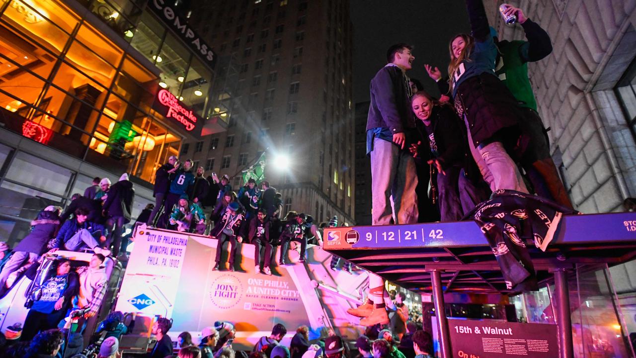 Philadelphia's Wild Celebration: Champagne, Fireworks, and Climbing Poles