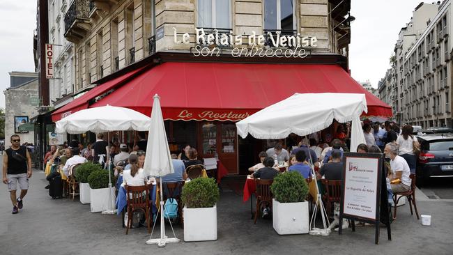 Le Relais de Venise L’Entrecote in Paris, with the line stretching around the side. Picture: Michael Klein